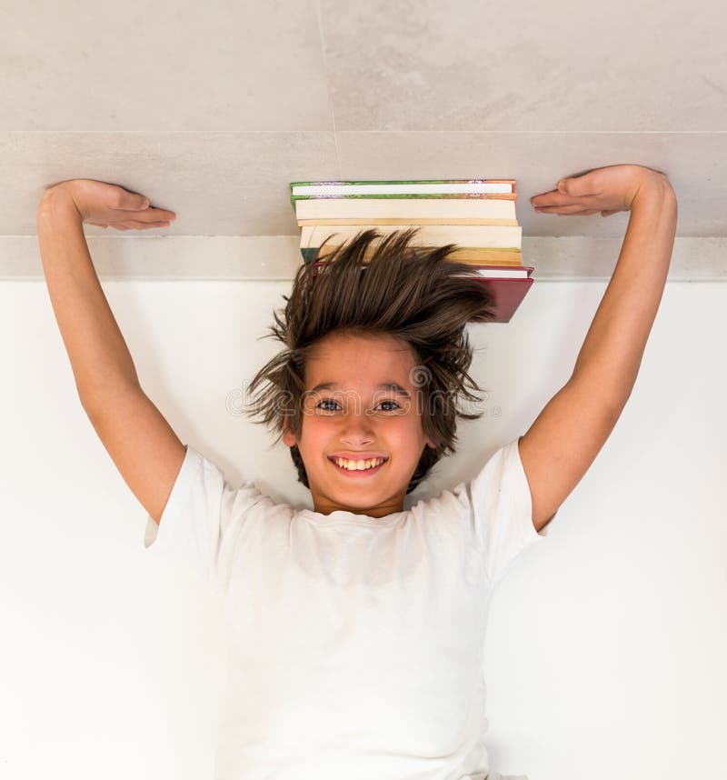 Kid with School Books Upside Down Stock Image Image of head, play 92413175