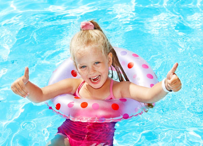 Kid Sitting on Inflatable Ring. Stock Photo - Image of inflatable ...