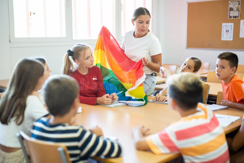 Kids attending to teacher&#x27;s lecture about LGBT