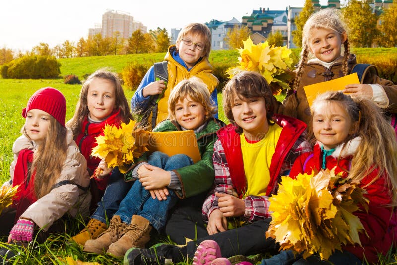 Kids on autumn lawn