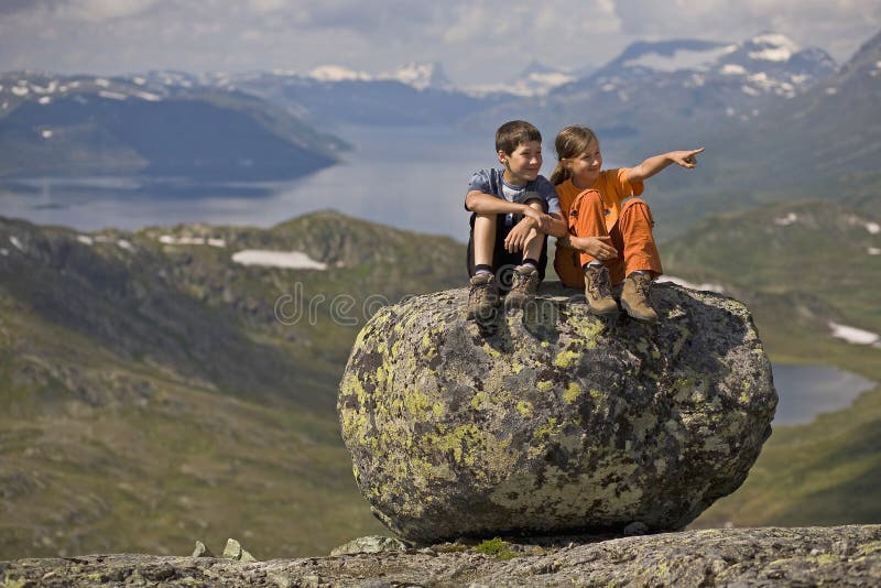 Kids on a big stone