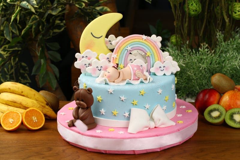 Kids birthday party cake - sky consept. Big birthday cake decorated with sky, clouds, stars, moon, rainbow, baby and bear stock photo Kids birthday party cake - sky consept. Big birthday cake decorated with sky, clouds, stars, moon, rainbow, baby and bear stock photo