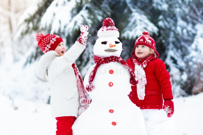 https://thumbs.dreamstime.com/b/kids-building-snowman-children-snow-winter-fun-build-men-playing-outdoors-sunny-snowy-day-outdoor-family-christmas-vacation-101192591.jpg