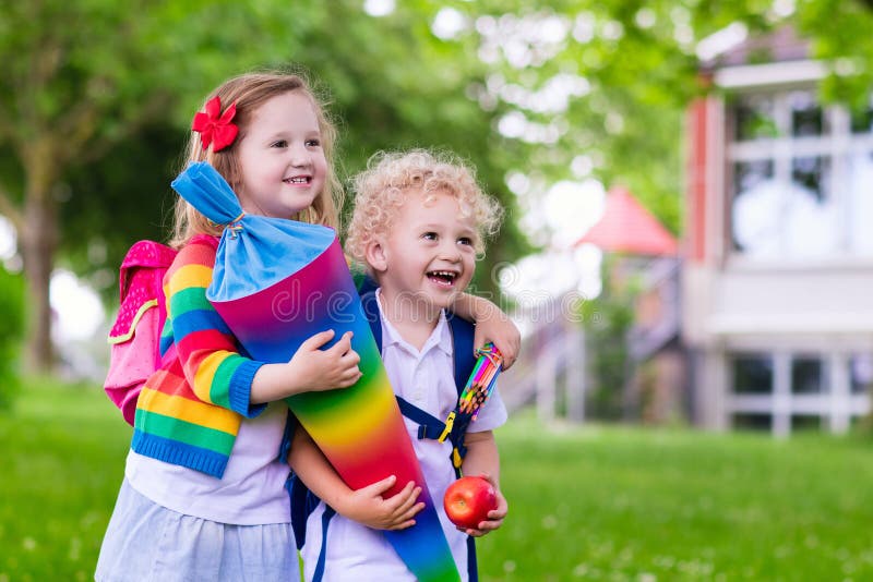 Kids With Candy Cone On First School Day In Germany