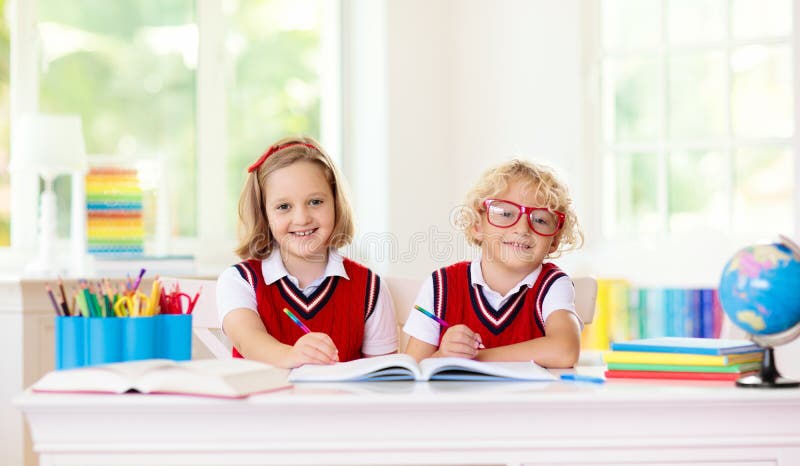 Kids go back to school. Children study and learn for preschool. Boy and girl of elementary class doing homework. Bedroom with desk, books and globe for young child. Kid learning to read and write. Kids go back to school. Children study and learn for preschool. Boy and girl of elementary class doing homework. Bedroom with desk, books and globe for young child. Kid learning to read and write