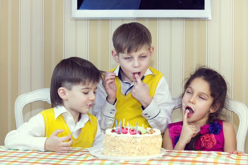 Kids eat cake stock image. Image of brother, holiday - 60105143