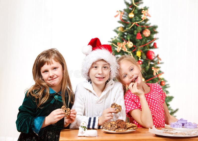 Kids eating cookies