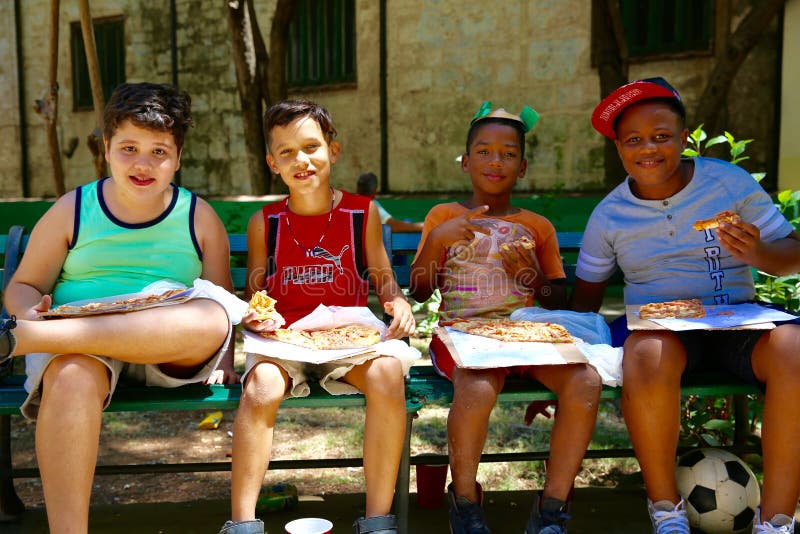 Kids Eating Pizza, Cuba royalty free stock images Kids Eating Pizza, Cuba royalty free stock images
