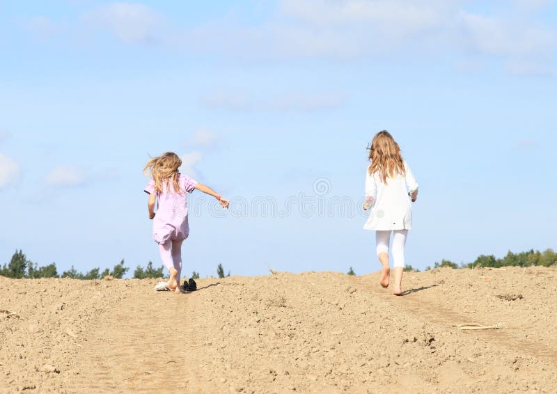 Kids - girls running on field