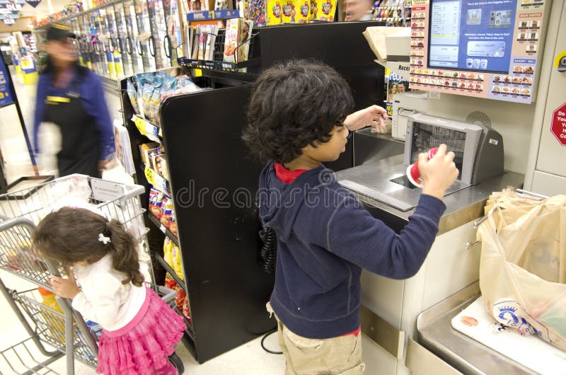 Kids grocery shopping stock photo
