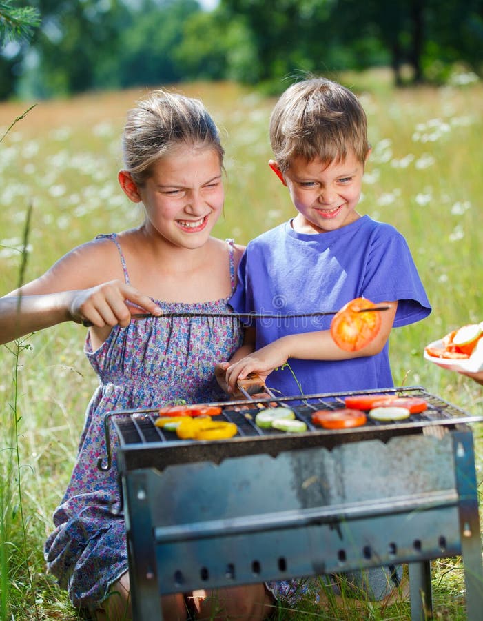 Kids Having a Barbecue Party Stock Photo Image of picnic, grill 41513754