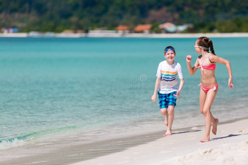 Kids having fun at beach royalty free stock images Kids having fun at beach royalty free stock images