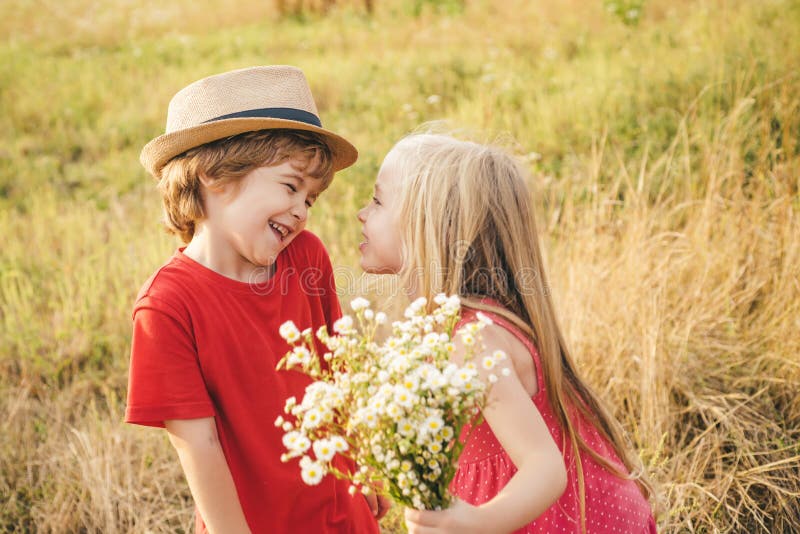Kids Having Fun in Field Against Nature Background. Valentine. Sweet Angel Children Stock Image - Image of emotions, couple: 158971953 Kids Having Fun in Field Against Nature Background. Valentine. Sweet Angel Children Stock Image - Image of emotions, couple: 158971953