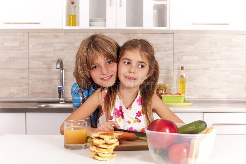 Kids in the kitchen stock photo. Image of nutrition, meal - 39340470