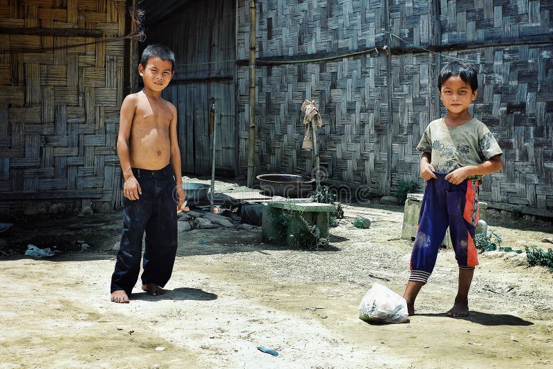 Kids from the Lolo Tribe Playing Football with a Plastic Bag Filled with Trash
