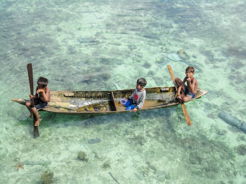 Kids at Mabul island, Malaysia royalty free stock images Kids at Mabul island, Malaysia royalty free stock images