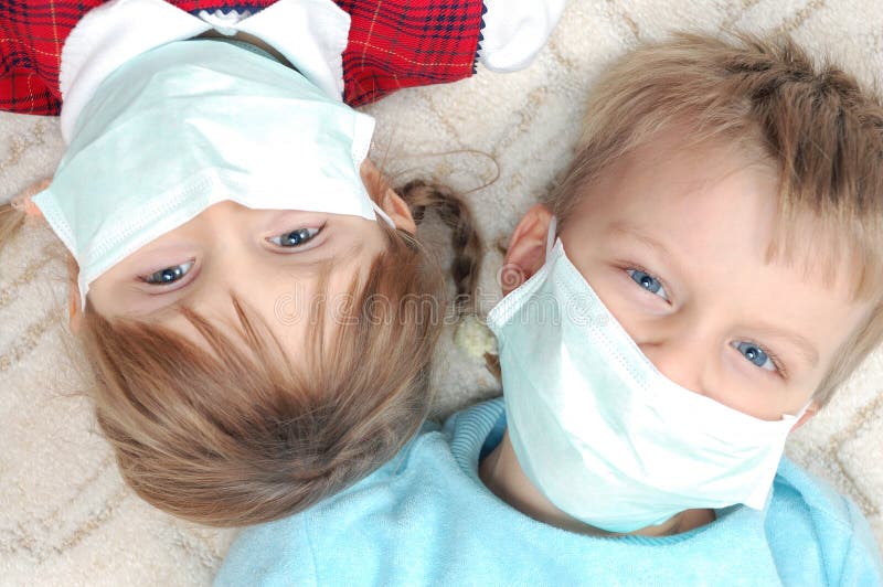 Kids with madicine protective masks royalty free stock photography Kids with madicine protective masks royalty free stock photography