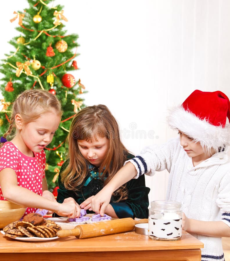 Kids making Christmas cookies