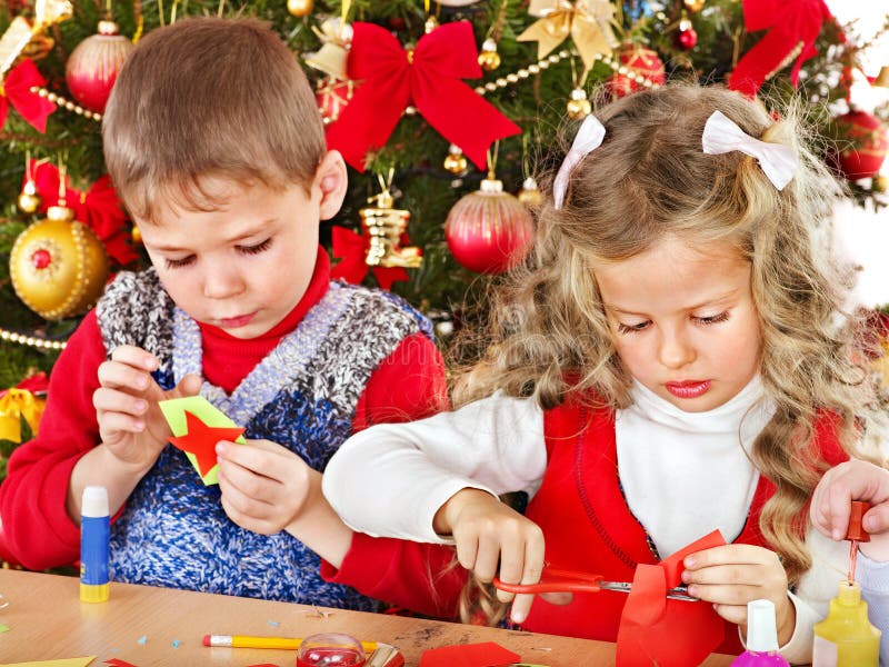 Kids making decoration for Christmas. stock image Kids making decoration for Christmas. stock image