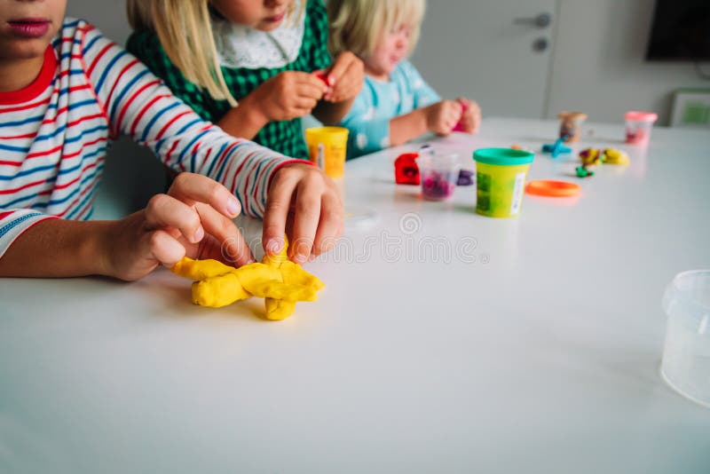 Kids Play with Clay Molding Shapes, Learning through Play Stock Image