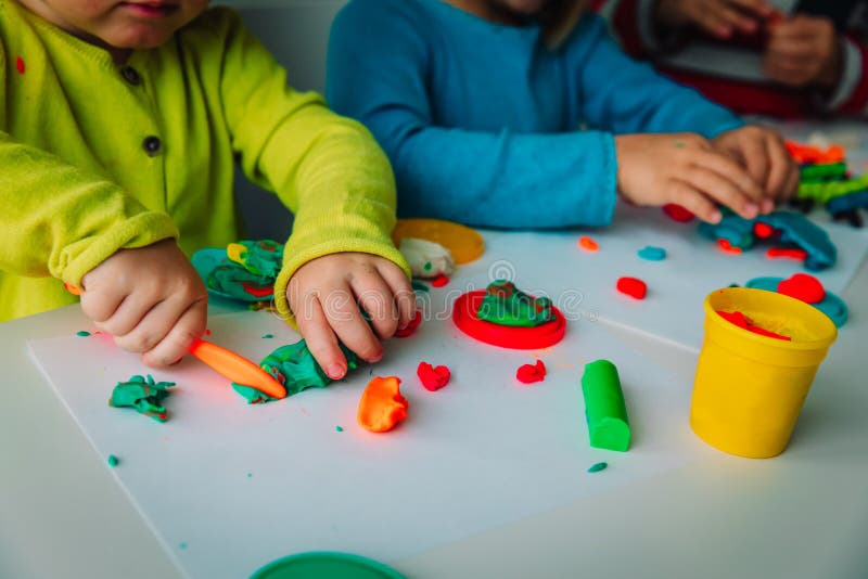 Kids Play with Clay Molding Shapes, Learning through Play Stock Image