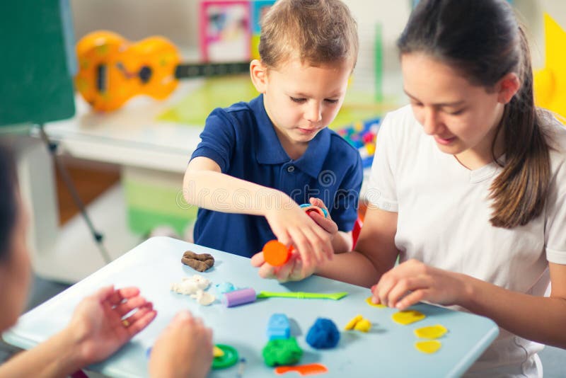 Kids Play Modeling Plasticine royalty free stock photo Kids Play Modeling Plasticine royalty free stock photo