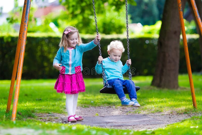 Kids On Playground Swing Stock Photo Image Of Friends 57178832
