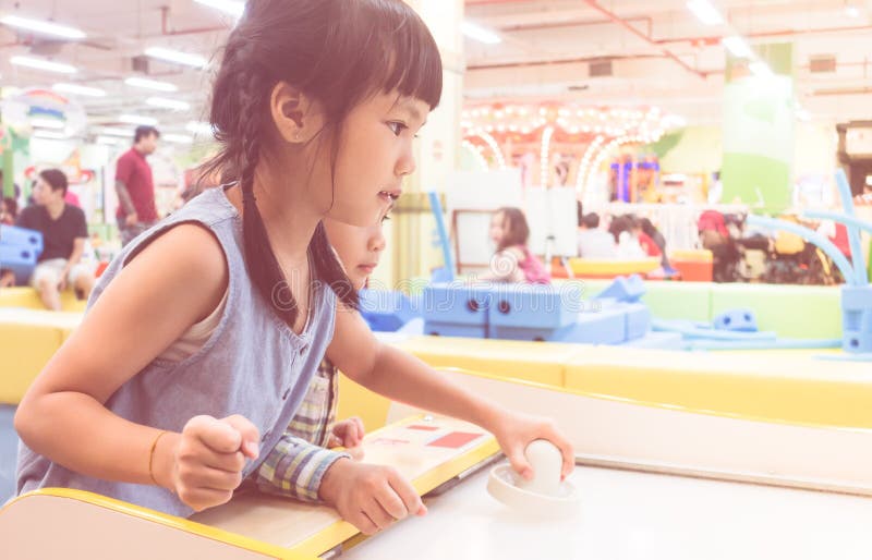 Kids Playing with Air Hockey Table in Playground Stock Photo Image of sport, table 107542264