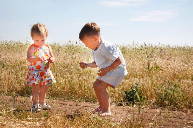 Kids playing on coutry road