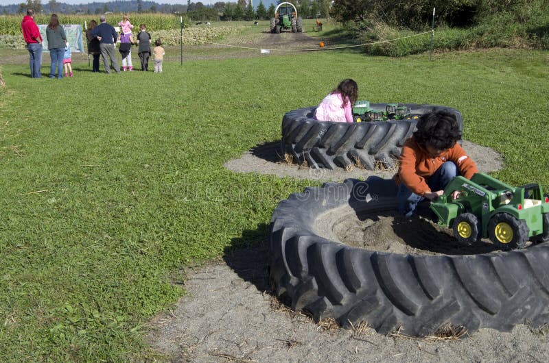 Kids playing at pumpkin farm stock images Kids playing at pumpkin farm stock images