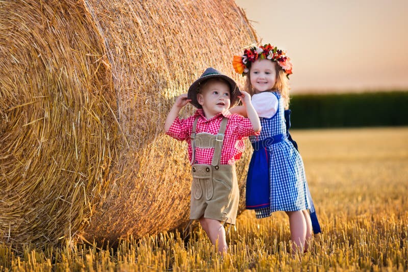 Kids playing in wheat field in Germany stock photography Kids playing in wheat field in Germany stock photography