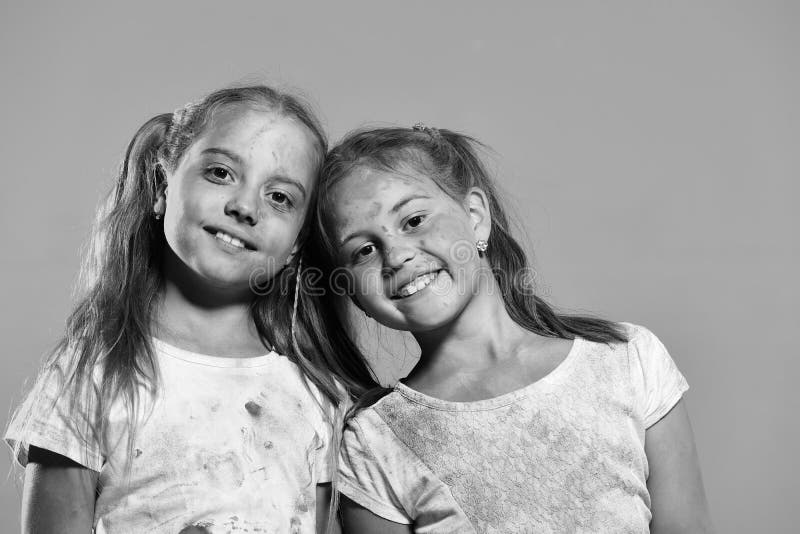 Kids with Ponytails Stand Head To Head. Schoolgirls Have Paint Spots on Faces and Tshirts Stock Photo - Image of game, happy: 119805722 Kids with Ponytails Stand Head To Head. Schoolgirls Have Paint Spots on Faces and Tshirts Stock Photo - Image of game, happy: 119805722
