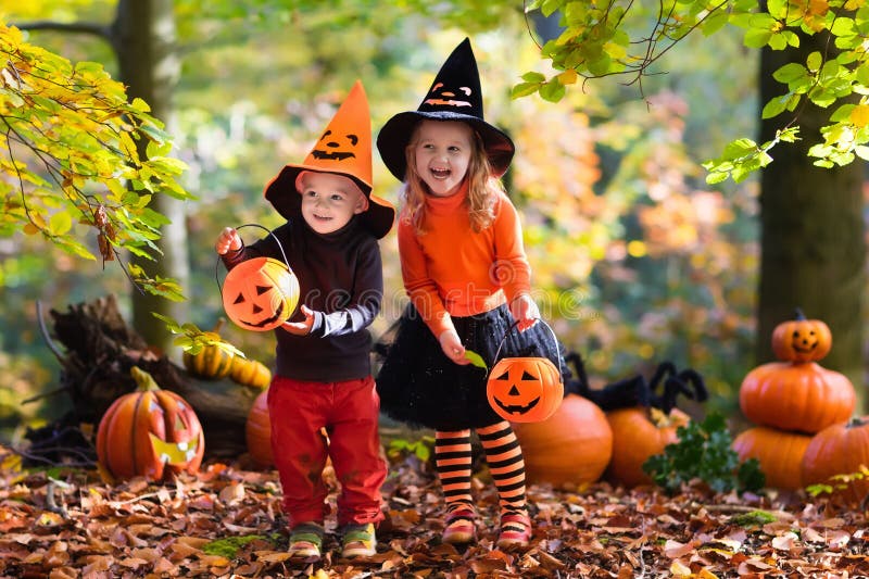 Kids with Pumpkins on Halloween Stock Image - Image of dressed, carving ...