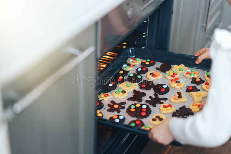 Kids Put Cookies on a Baking Sheet in the Oven Stock Photo Image of