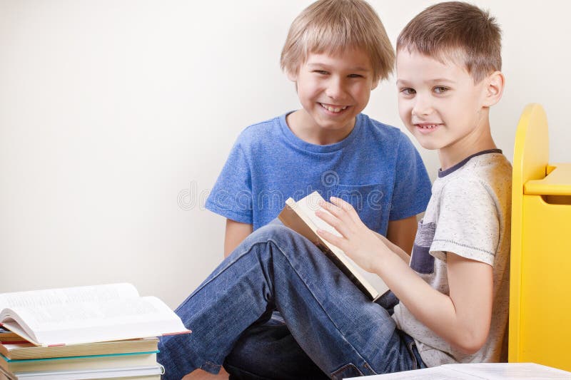 Kids reading books at home royalty free stock image Kids reading books at home royalty free stock image