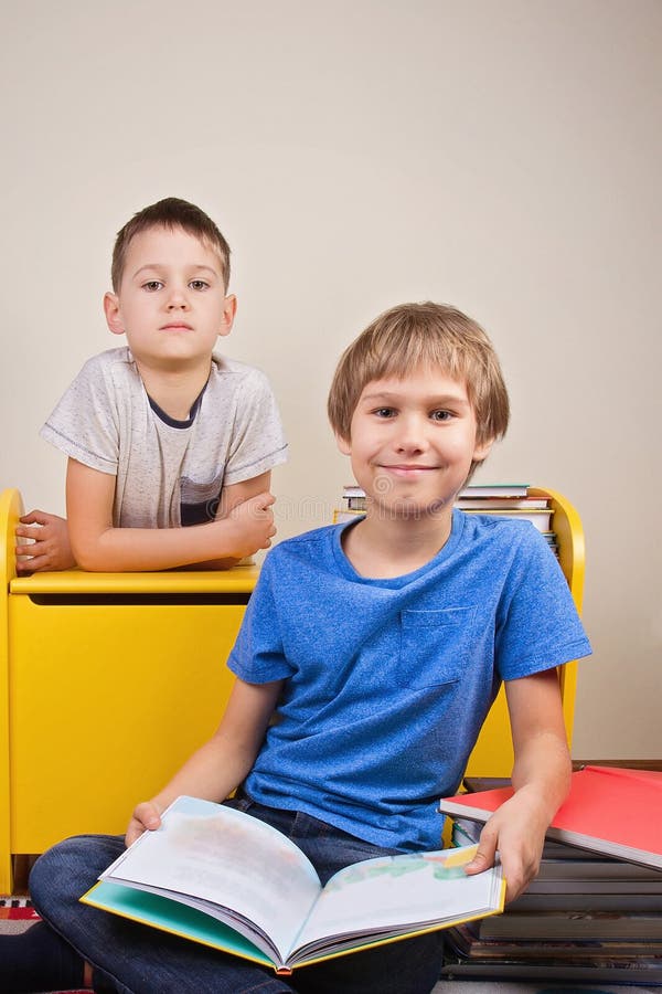 Kids reading books at home stock images Kids reading books at home stock images