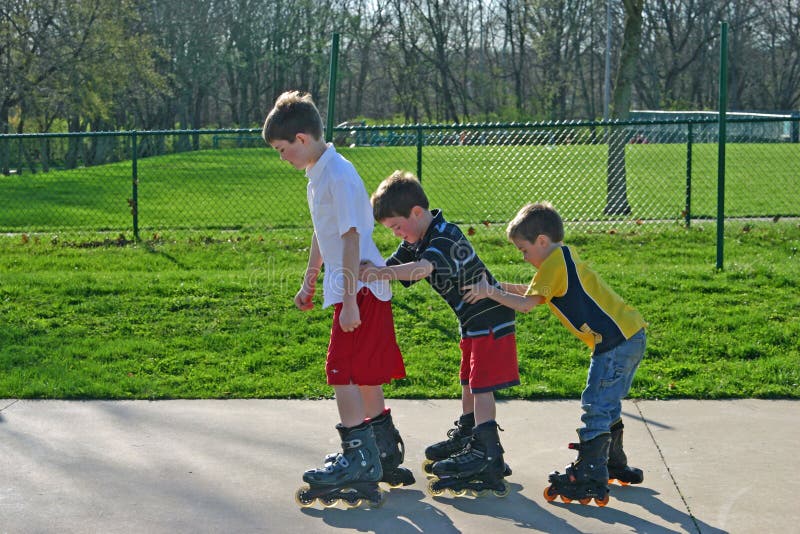 Kids Roller-Blading royalty free stock photo Kids Roller-Blading royalty free stock photo