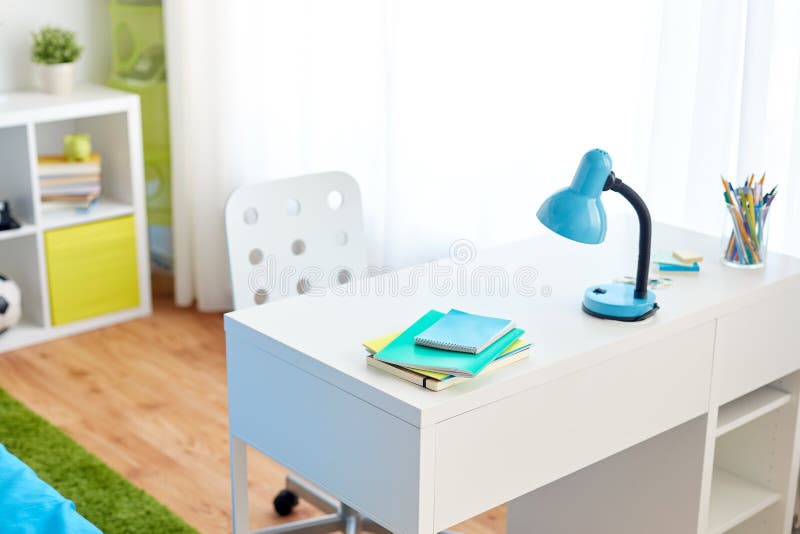 Kids room interior with table and school staff