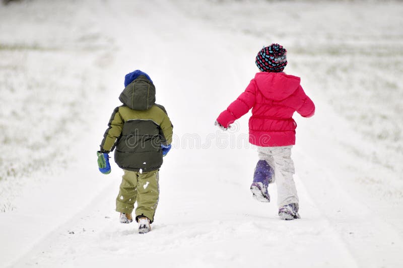 Kids running in snow