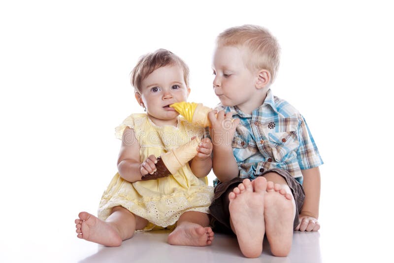 Kids smiling and eating ice cream