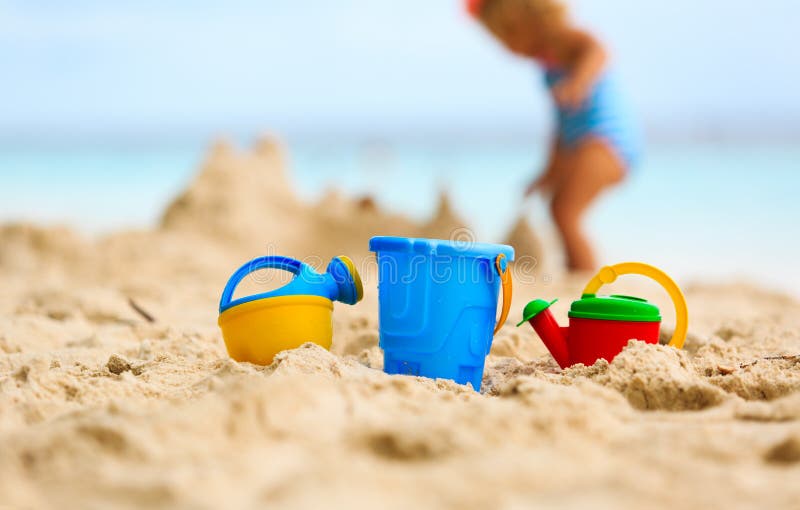 Kids Toys and Little Girl Building Sandcastle Stock Photo - Image of ...