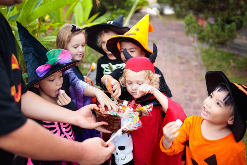 Kids trick or treat. Halloween. Child at door