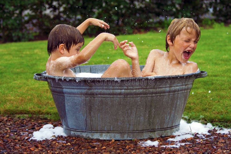 Kids in zinc bathtub