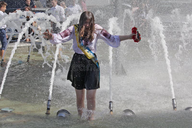 Kiev, Ukraine - May 27, 2016: Kiev graduates bathe in fountains. Last call 2016. Kiev, Ukraine - May 27, 2016: Kiev graduates bathe in fountains. Last call 2016