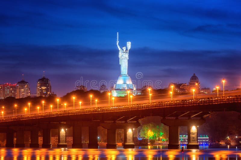 Kiev, Ukraine - May 04, 2018: View of the Paton bridge, Motherland monument and Dnieper river at night, beautiful cityscape stock photo Kiev, Ukraine - May 04, 2018: View of the Paton bridge, Motherland monument and Dnieper river at night, beautiful cityscape stock photo