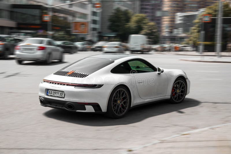 Kiev, Ukraine - May 22, 2021: White Supercar Porsche 911 Carrera 4S in  Motion. High Speed Editorial Photo - Image of speed, 2021: 221321061