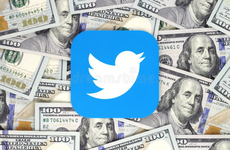 Twitter icon printed on paper and placed on money background