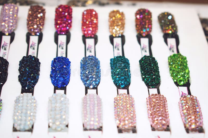 KIEV, UKRAINE – 19 SEPTEMBER, 2018: Nail Art Rhinestone samples. Color Nail Rhinestones Glitter Crystal Flat back 3D Nail Art stock photos KIEV, UKRAINE – 19 SEPTEMBER, 2018: Nail Art Rhinestone samples. Color Nail Rhinestones Glitter Crystal Flat back 3D Nail Art stock photos