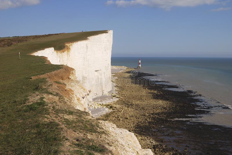 Kiezelachtige Hoofd en vuurtoren. Eastbourne. Engeland royalty-vrije stock foto Kiezelachtige Hoofd en vuurtoren. Eastbourne. Engeland royalty-vrije stock foto