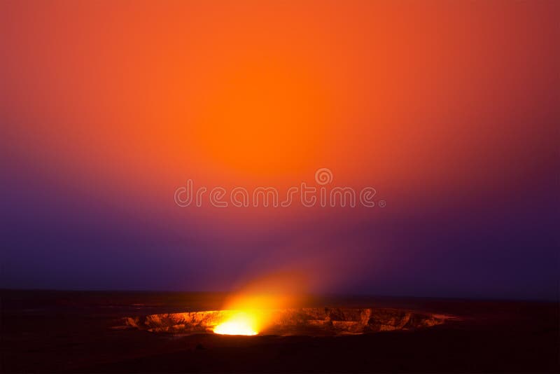 A 30-minute exposure at 3am of the glowing lava lake in the caldera of Hawaii's Kilauea Volcano bounces light off of the haze drifting by in the sky. A 30-minute exposure at 3am of the glowing lava lake in the caldera of Hawaii's Kilauea Volcano bounces light off of the haze drifting by in the sky.